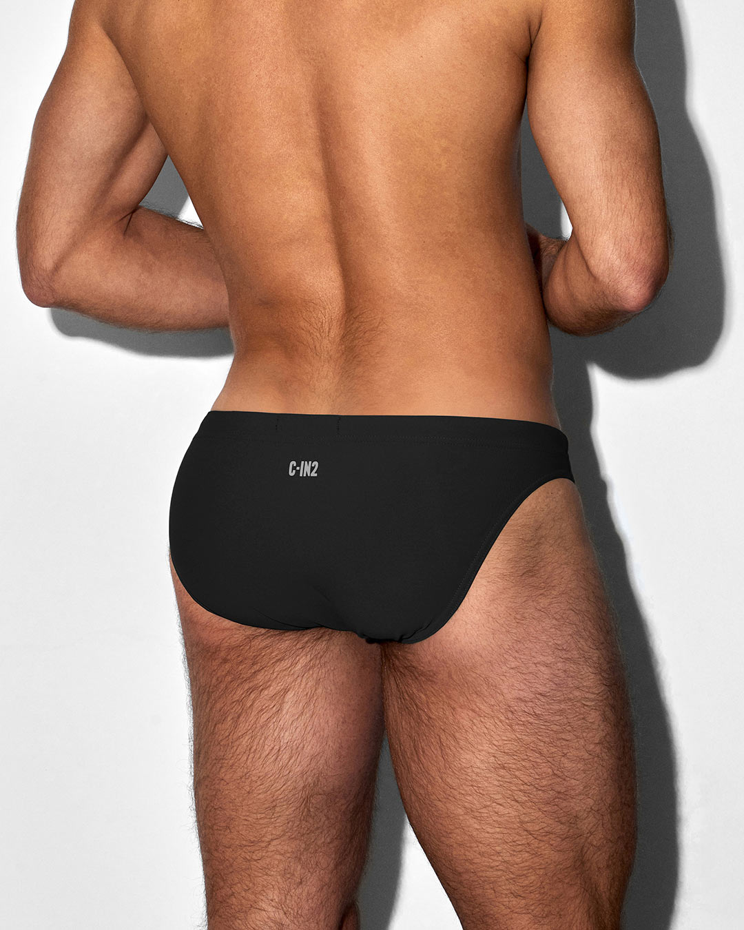 C-IN2 Swim Tanga in solid black – men's low-rise swim tanga between brief and thong