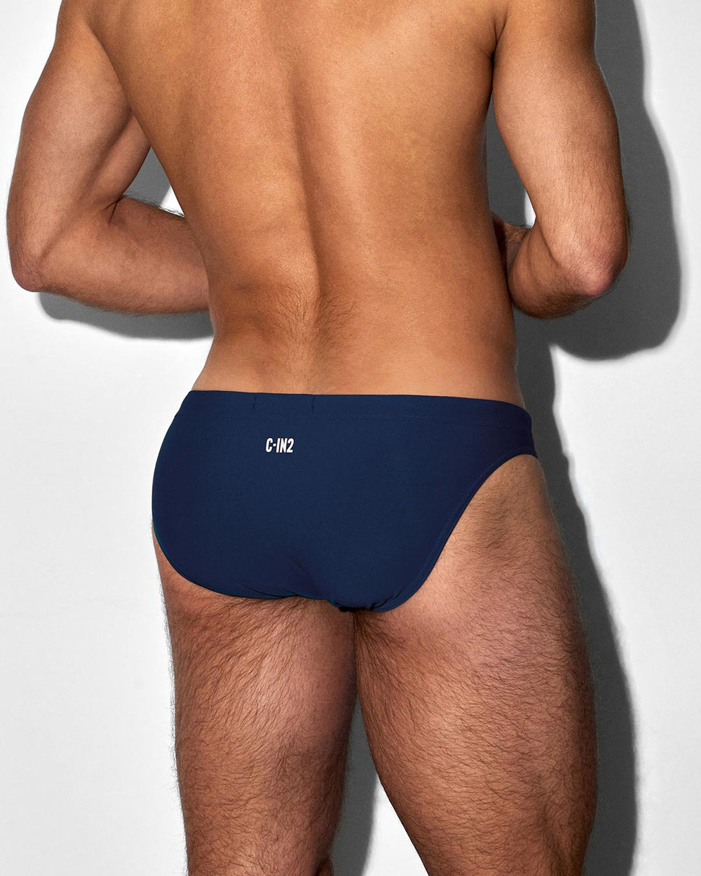 C-IN2 Swim Tanga in solid navy – men's low-rise swim tanga lined contour pouch