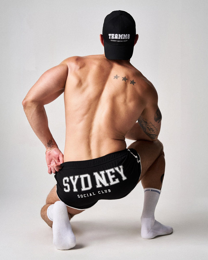 TEAMM8 SSC Legacy Scallop Short in black – contrast piping side split athletic short