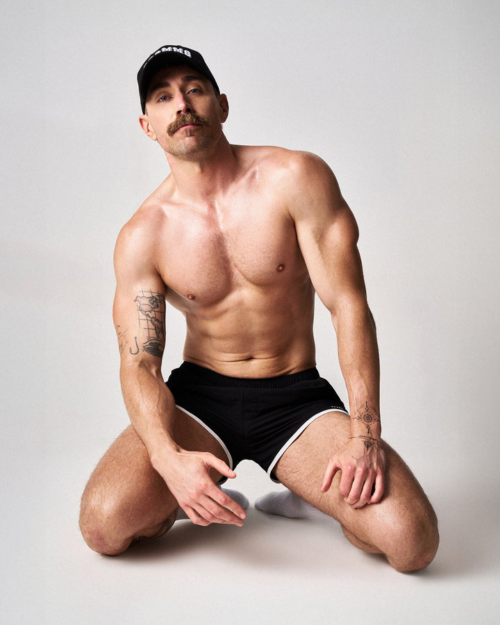 TEAMM8 SSC Legacy Scallop Short in black – contrast piping side split athletic short