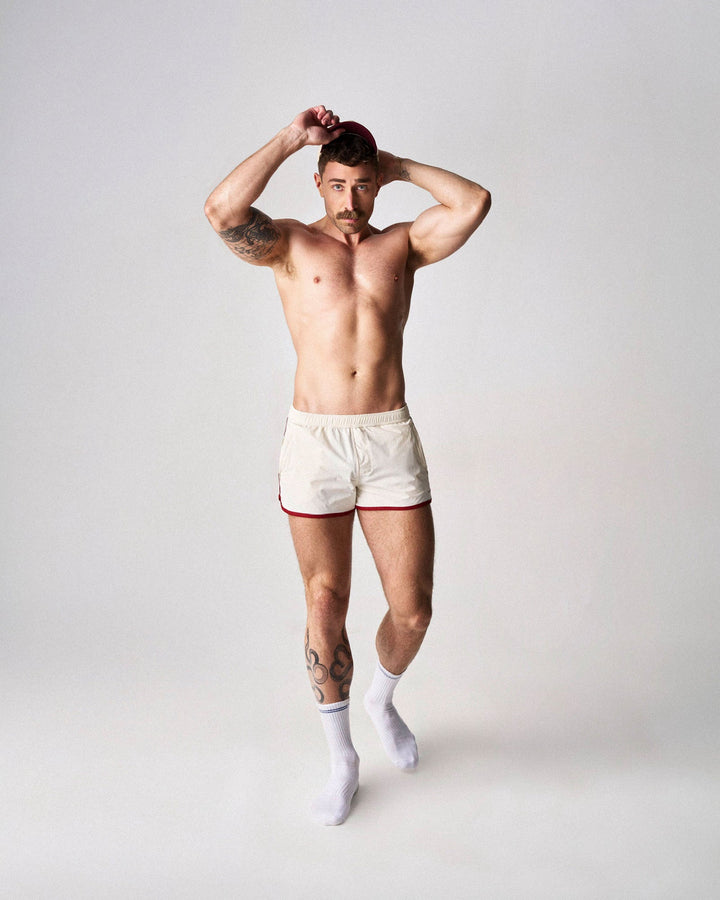 TEAMM8 SSC Legacy Scallop Short in creme – contrast piping side split athletic short