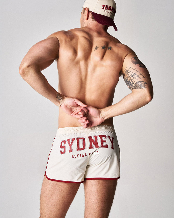 TEAMM8 SSC Legacy Scallop Short in creme – contrast piping side split athletic short