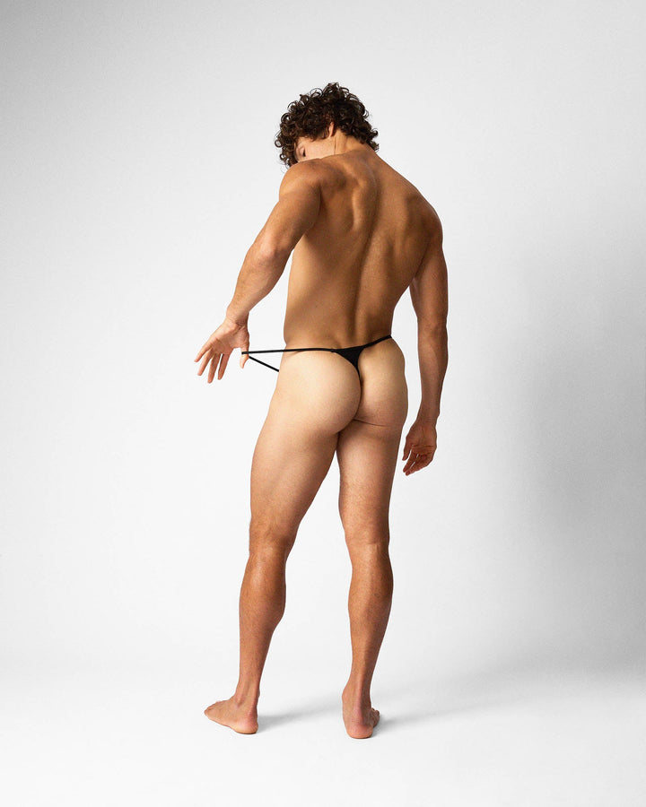 TEAMM8 Flaunt Micro Thong in onyx black – ultra-thin strap barely-there triangle back thong