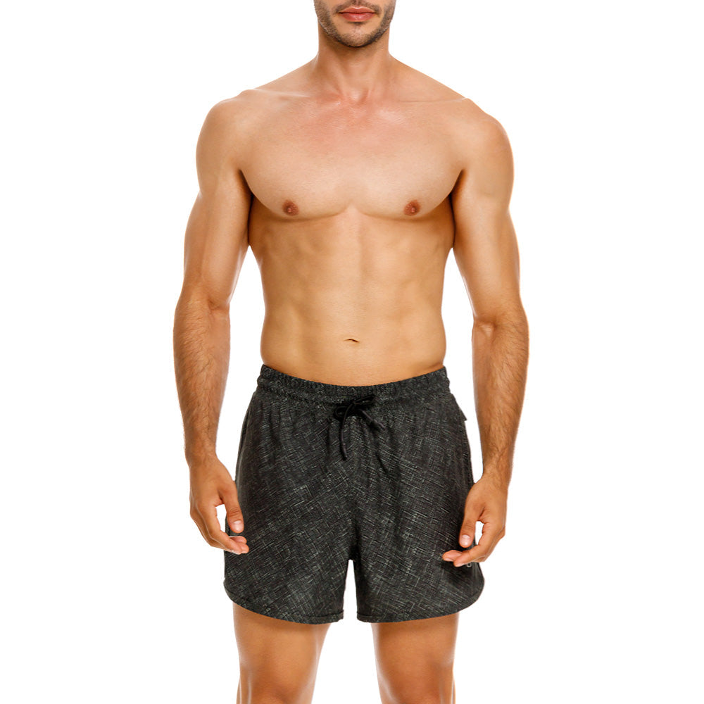 Mundo Unico Motriz running shorts in green – geometric quick-dry performance running shorts