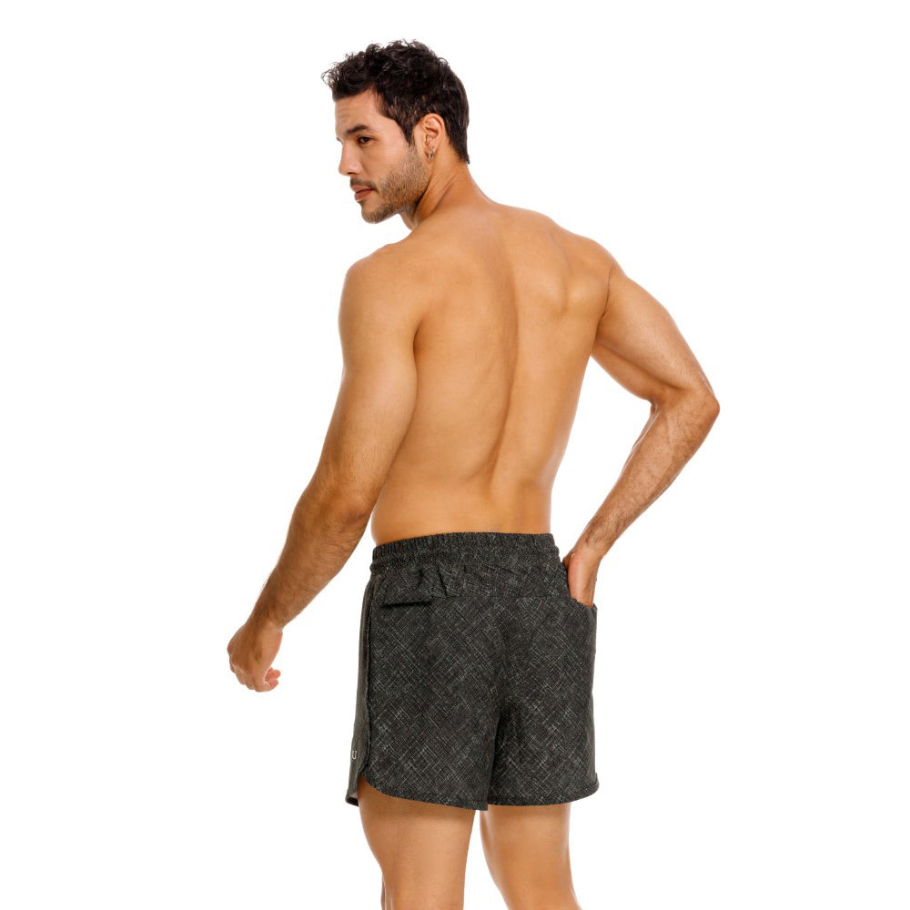 Mundo Unico Motriz running shorts in green – geometric quick-dry performance running shorts