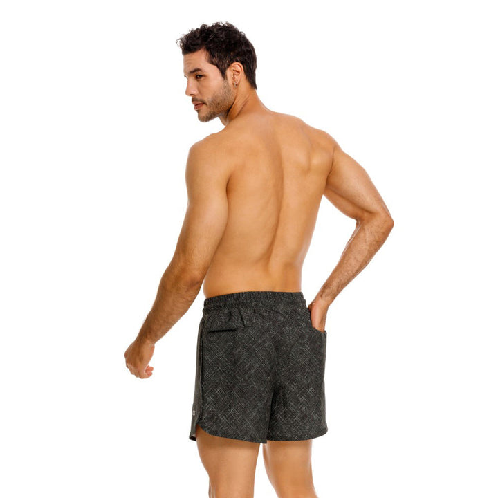 Mundo Unico Motriz running shorts in green – geometric quick-dry performance running shorts