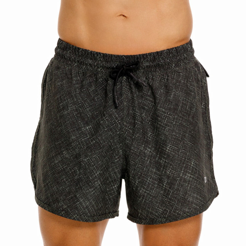 Mundo Unico Motriz running shorts in green – geometric quick-dry performance running shorts