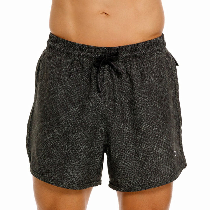 Mundo Unico Motriz running shorts in green – geometric quick-dry performance running shorts
