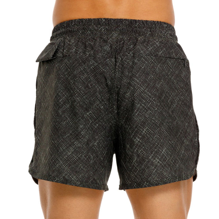 Mundo Unico Motriz running shorts in green – geometric quick-dry performance running shorts