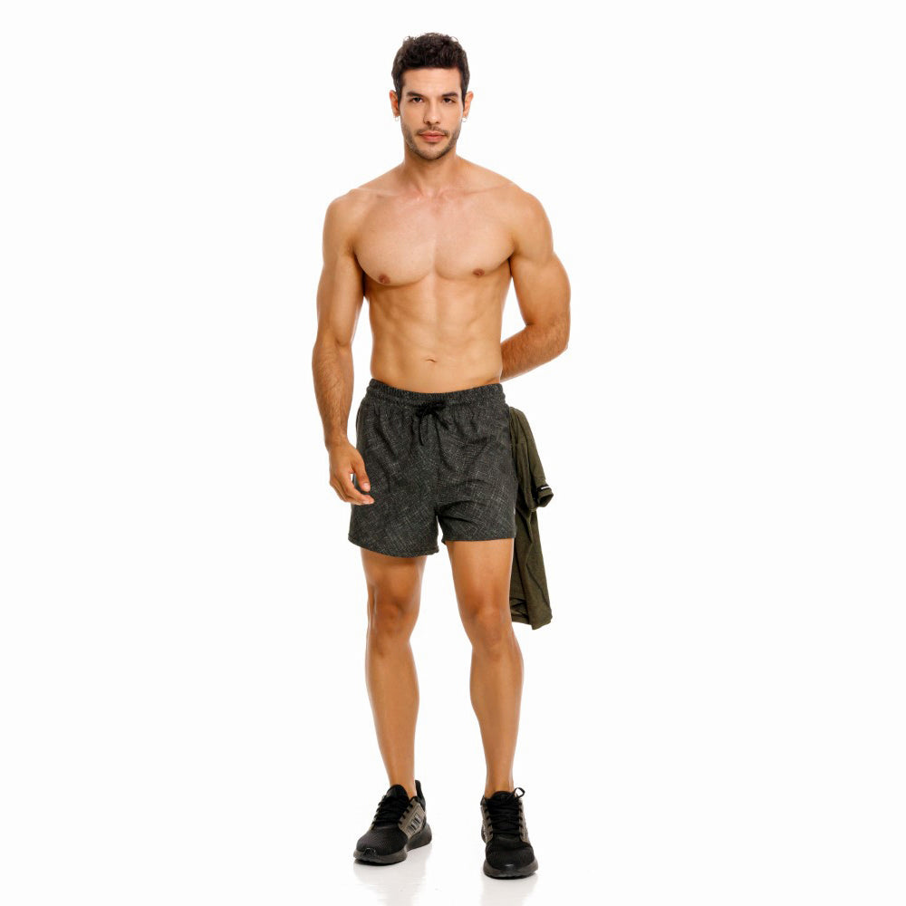 Mundo Unico Motriz running shorts in green – geometric quick-dry performance running shorts
