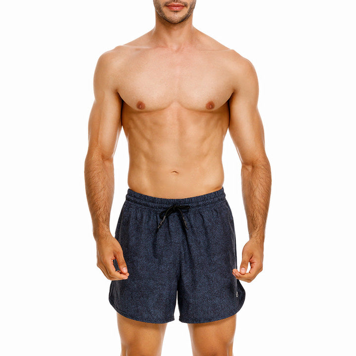Mundo Unico Tecnica running shorts in blue – geometric Action Tech reflective logo performance shorts