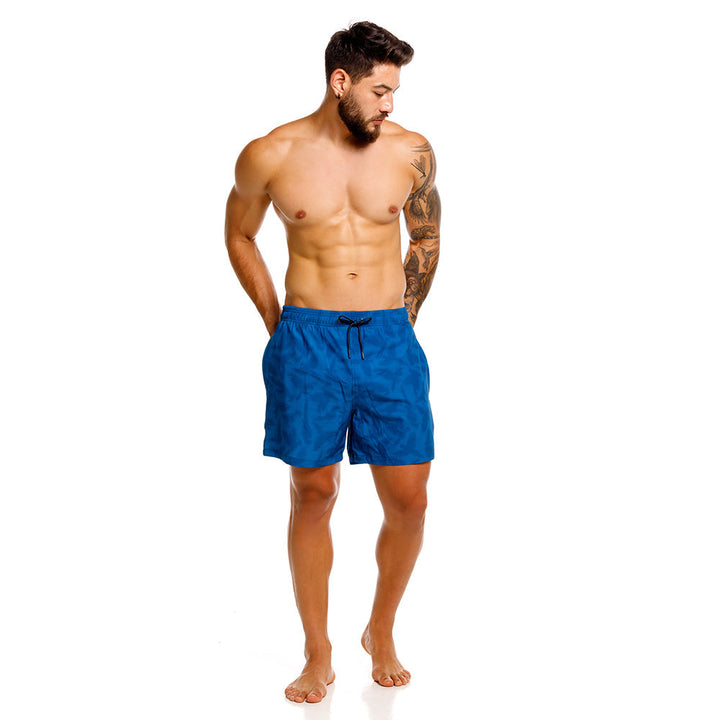 Mundo Unico Guacamaya board shorts in blue – tropical macaw parrot print swim shorts
