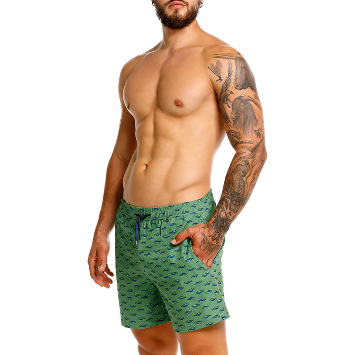 Mundo Unico Mahi Mahi board shorts in green – tropical fish print mid-length swim shorts