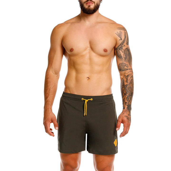 Mundo Unico Racimo board shorts in green – grape bunch print mid-length swim shorts
