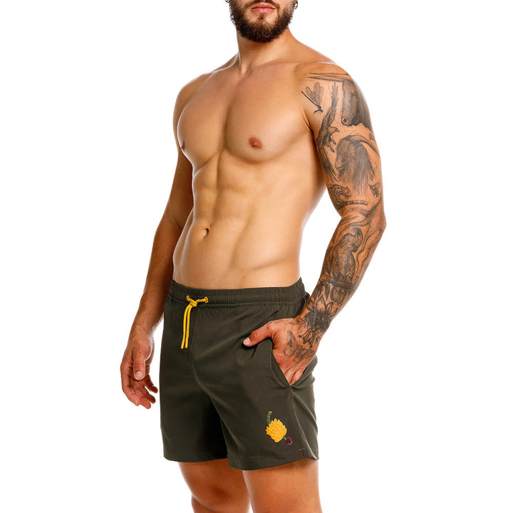 Mundo Unico Racimo board shorts in green – grape bunch print mid-length swim shorts