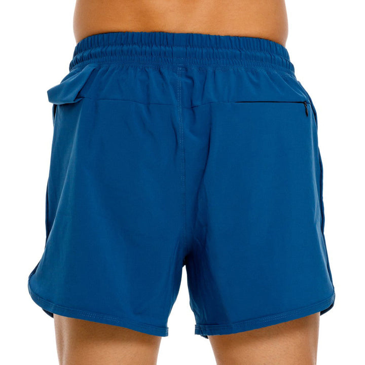 Mundo Unico Intervalos running shorts in blue – towel tunnel zip pocket reflective training shorts