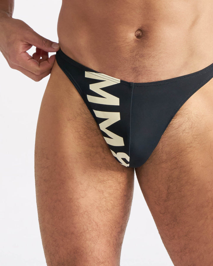 TEAMM8 Arena Swim Thong in black – logo high hip cut fully lined swim thong