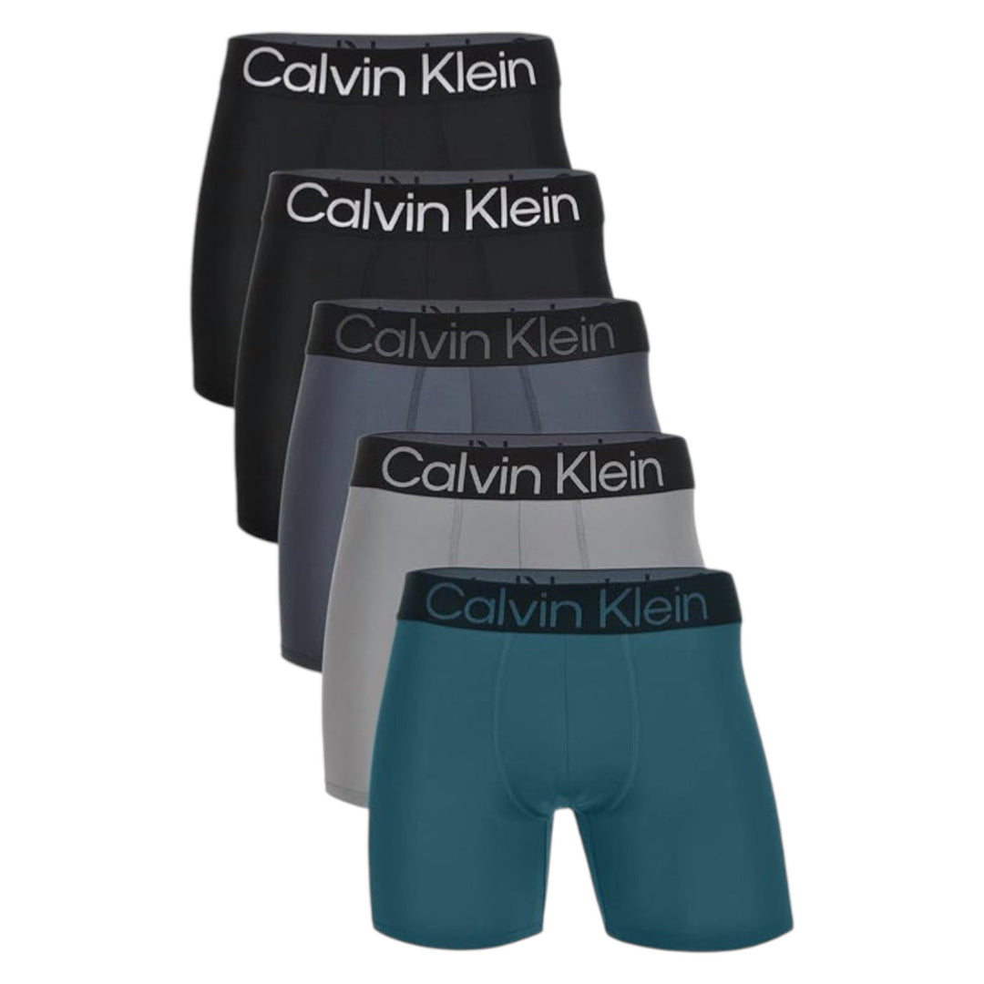 Calvin Klein Bold Logo 5-pack boxer briefs in black, grey, and teal, flat lay on white background