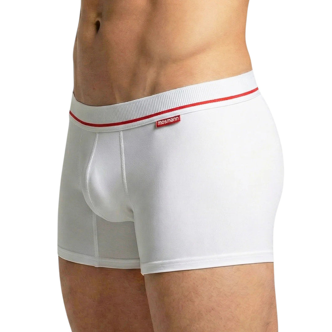 Side view of Mosmann bamboo trunks on model, showing leg hem and side seam fit