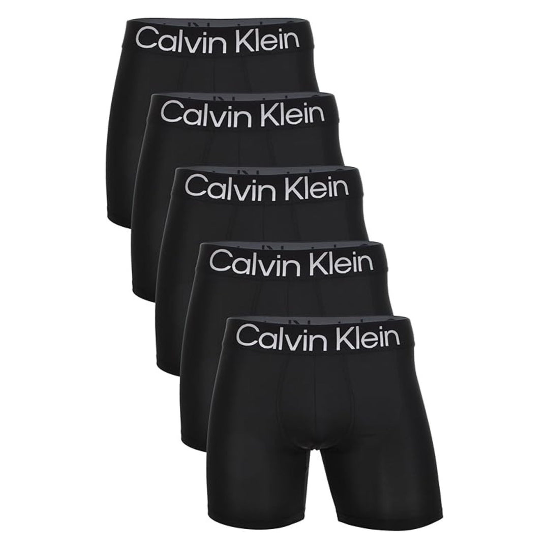 Calvin Klein Bold Logo 5-pack boxer briefs in black, flat lay on white background