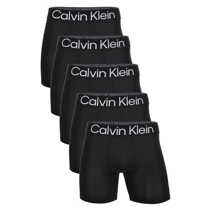 Calvin Klein Bold Logo 5-pack boxer briefs in black, flat lay on white background