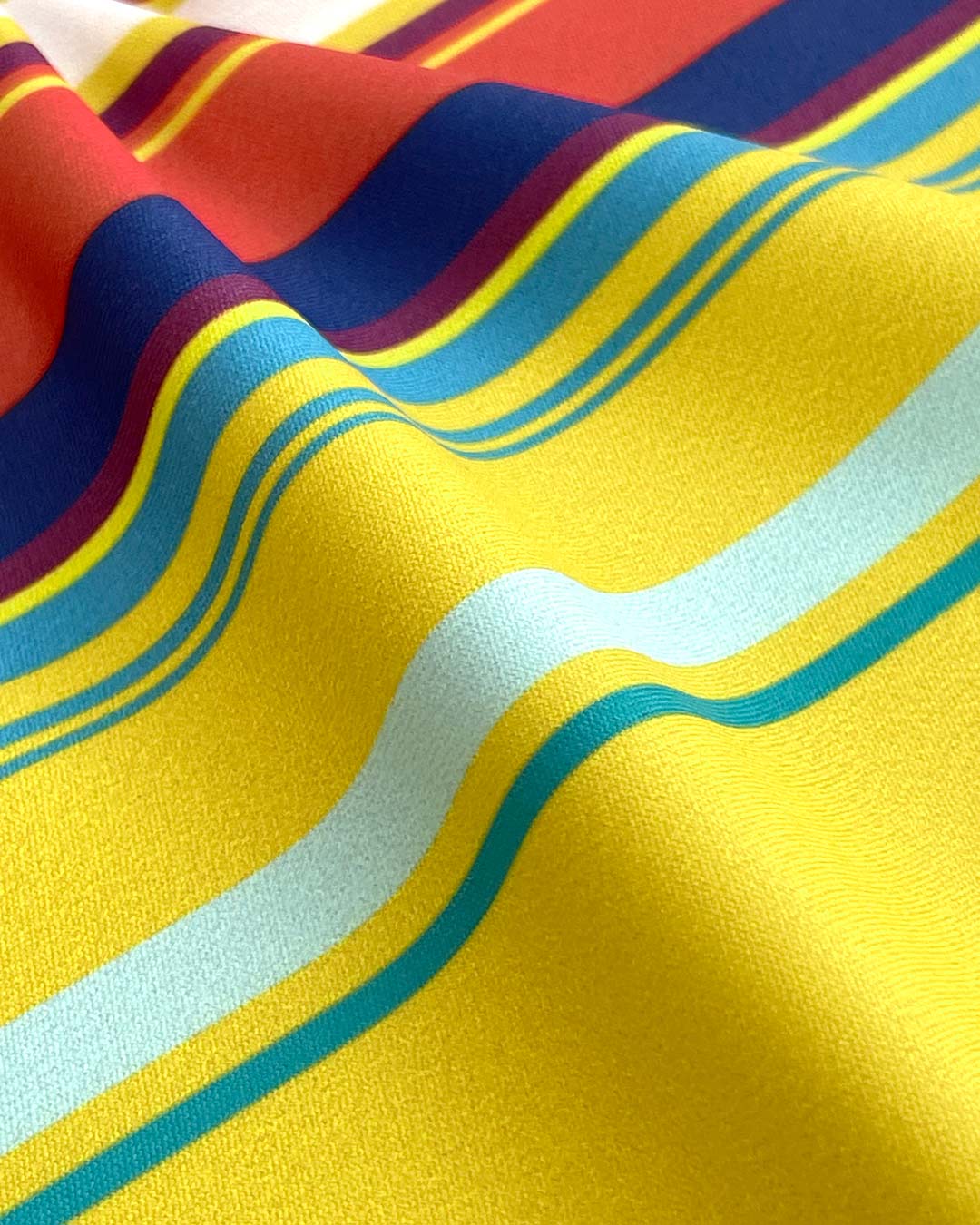 C-IN2 Swim Brief in red yellow horizontal stripes – men's low-rise striped swim brief